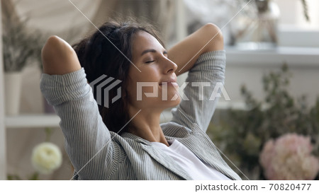 Young Caucasian woman relax relieving negative emotions 70820477