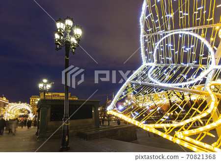 Christmas (New Year holidays) decoration in Moscow (at night), Russia-- Manege Square near the Kremlin Christmas (New Year holidays) decoration in Moscow (at night), Russia-- Manege Square near the Kremlin 70821368
