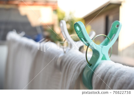 Clean laundry that has been washed and turned white Clean laundry that has been washed and turned white 70822738