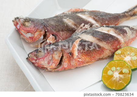 Deep-fried Okinawan prefectural fish Gurukun and Shikuwasa 70823634