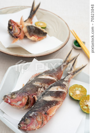 Deep-fried Okinawan prefectural fish Gurukun and 2 kinds of Shikuwasa Deep-fried Okinawan prefectural fish Gurukun and 2 kinds of Shikuwasa 70823848