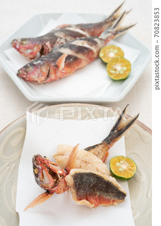 Deep-fried Okinawan prefectural fish Gurukun and 2 kinds of Shikuwasa Deep-fried Okinawan prefectural fish Gurukun and 2 kinds of Shikuwasa 70823853