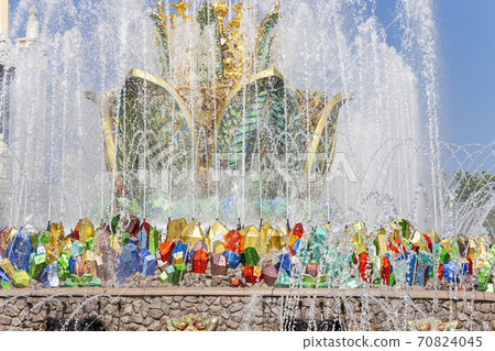 Fountain Stone Flower at VDNKh in Moscow. VDNKh (called also All-Russian Exhibition Center) is a permanent general-purpose trade show in Moscow, Russia 70824045