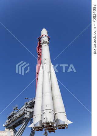 Spaceship Vostok (monument to the first Soviet rocket) shown at VDNKH park in Moscow, Russia. VDNH is a large city park, exhibition center and amusement park, popular touristic landmark 70824088