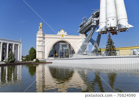 Spaceship Vostok (monument to the first Soviet rocket) shown at VDNKH park in Moscow, Russia. VDNH is a large city park, exhibition center and amusement park, popular touristic landmark 70824090