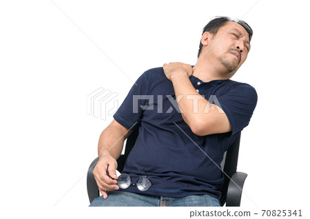 Asian man sit on chair and suffering from neck or shoulder pain isolated Asian man sit on chair and suffering from neck or shoulder pain isolated 70825341