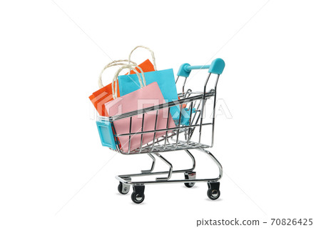 Shop cart with paper bags isolated on white background Shop cart with paper bags isolated on white background 70826425