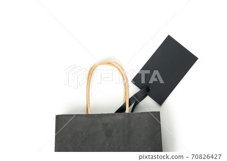 Paper bag with tag isolated on white background 70826427