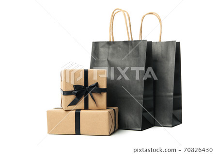 Gift boxes and paper bags isolated on white background Gift boxes and paper bags isolated on white background 70826430