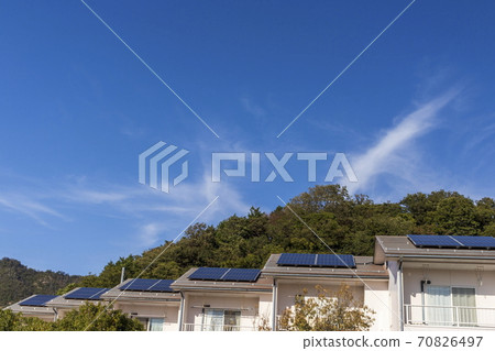 Eco-house and blue sky_solar housing complex Eco-house and blue sky_solar housing complex 70826497
