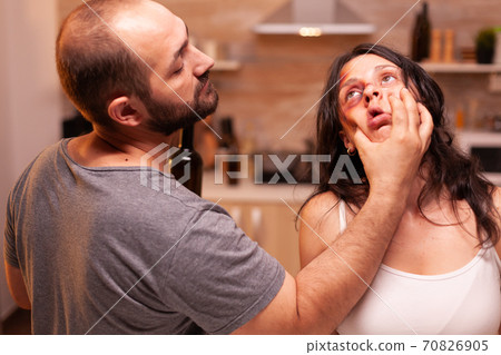 Drunk husband abusing wife Drunk husband abusing wife 70826905