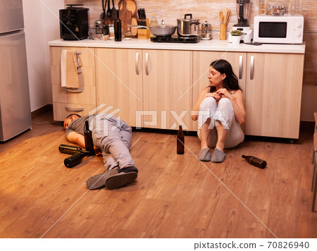 Scared wife after being beaten Scared wife after being beaten 70826940
