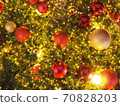 Christmas background. Christmas decorations balls, light, star, snowflake on Christmas tree. 70828203