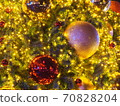 Christmas background. Christmas decorations balls, light, star, snowflake on Christmas tree. 70828204