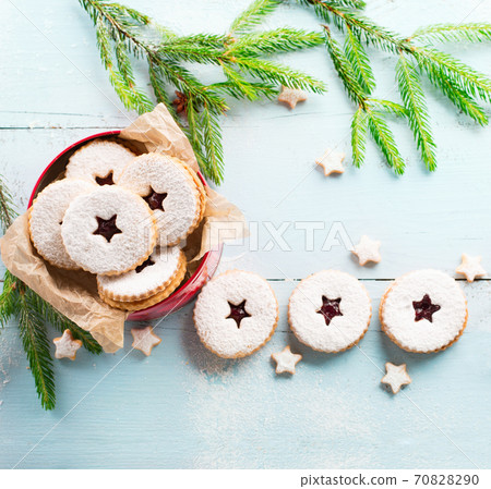 Traditional Christmas Linzer cookies with raspberry jam. 70828290
