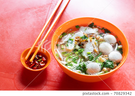 Simple Chinese fishball noodle soup served in bowl Simple Chinese fishball noodle soup served in bowl 70829342