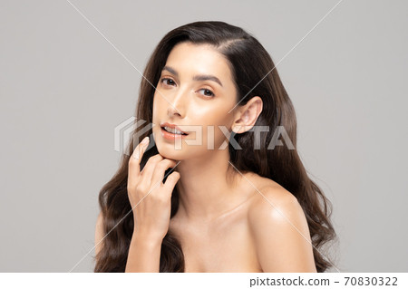 Beautiful Glamour indian woman touch chin smile with clean and fresh skin Happiness and cheerful with positive emotional,isolated on grey background,Beauty Cosmetics and spa Facial treatment Concept Beautiful Glamour indian woman touch chin smile with clean and fresh skin Happiness and cheerful with positive emotional,isolated on grey background,Beauty Cosmetics and spa Facial treatment Concept 70830322
