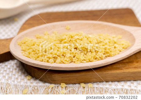 Ingredients for Italian pasta with tiny stelline pasta usually used in soups. close up Ingredients for Italian pasta with tiny stelline pasta usually used in soups. close up 70832202