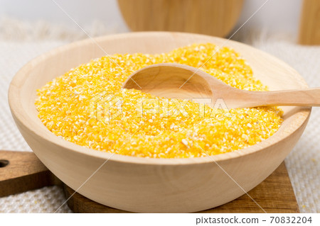 Dry Corn grits. The concept of the production of cereals from grain, products from corn. Dry Corn grits. The concept of the production of cereals from grain, products from corn. 70832204