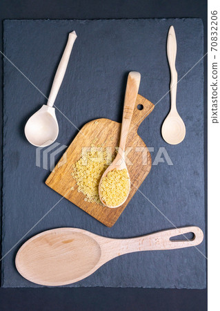 food background durum wheat semolina pasta stelle on a black background, top view food background durum wheat semolina pasta stelle on a black background, top view 70832206