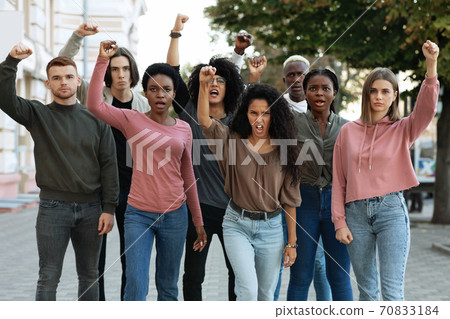 International group of young people making strike on the street 70833184
