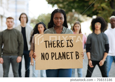 There is no planet B placard in african woman hands There is no planet B placard in african woman hands 70833186