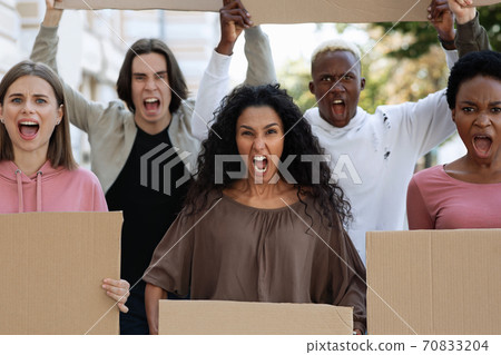 Closeup of desperate strikers with empty placards Closeup of desperate strikers with empty placards 70833204