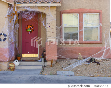 Sunny view of a beautiful Halloween decoration house Sunny view of a beautiful Halloween decoration house 70833384