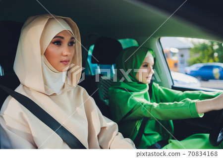 Arabic young Woman Couple Traveling By Car. Arabic young Woman Couple Traveling By Car. 70834168