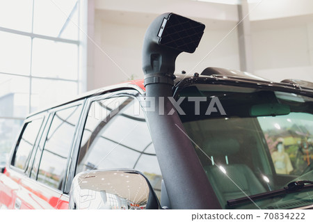 Close up shot of an off road car air intake, called snorkel. Close up shot of an off road car air intake, called snorkel. 70834222