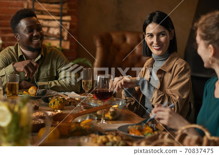 Goup of Friends at Dinner 70837475