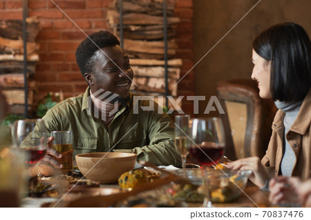 Friends Enjoying Dinner 70837476