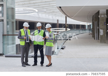 Business People Touring Construction of Shopping Mall 70837595