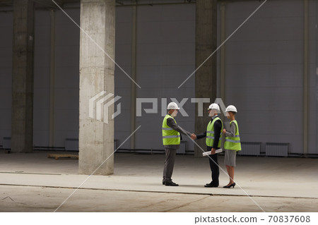 Investment Deal at Construction Site Investment Deal at Construction Site 70837608