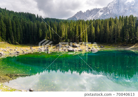 Beautiful view of famous Carezza lake at dolomite mountain, Ital 70840613