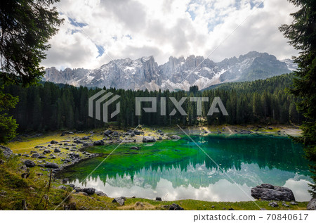 Beautiful view of famous Carezza lake at dolomite mountain, Ital 70840617