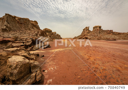 Salt rock formations and sky near Dallol volcano, stopped by on a tour of the Danakil Desert in Ethiopia 70840749