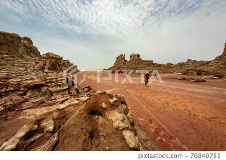Salt rock formations and sky near Dallol volcano, stopped by on a tour of the Danakil Desert in Ethiopia Salt rock formations and sky near Dallol volcano, stopped by on a tour of the Danakil Desert in Ethiopia 70840751