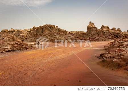 Salt rock formations and sky near Dallol volcano, stopped by on a tour of the Danakil Desert in Ethiopia Salt rock formations and sky near Dallol volcano, stopped by on a tour of the Danakil Desert in Ethiopia 70840753