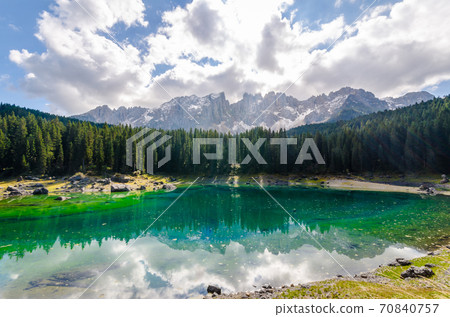 Beautiful view of famous Carezza lake at dolomite mountain, Ital Beautiful view of famous Carezza lake at dolomite mountain, Ital 70840757