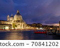 The Basilica of St Mary of Health or Basilica di Santa Maria della Salute at grand canal at night in Venice, Italy 70841202