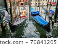 Gondola moor at pier in Venice 70841205