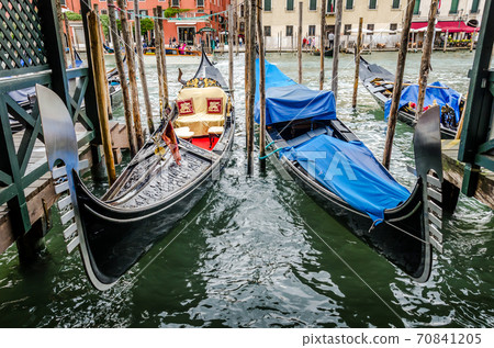 Gondola moor at pier in Venice 70841205