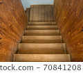 Old wooden stair down from building 70841208