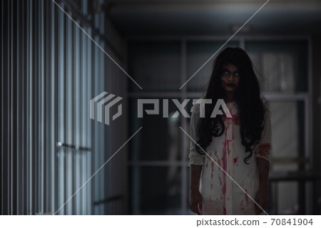 woman ghost creepy in a dark room at house woman ghost creepy in a dark room at house 70841904