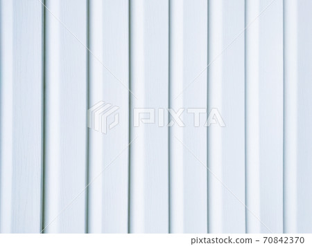 White vinyl wood siding panel background with imitation wood texture. 70842370