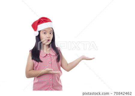 Portrait Little Asian girl wearing Santa hat 70842462