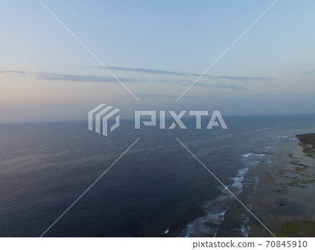 Morning of the sea in Okinawa-Aerial photography with a drone (near Peace Creation Forest Park / Yamagusuku, Itoman City, Okinawa Prefecture) 70845910