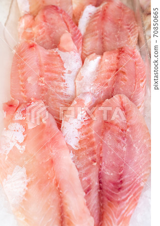 African perch fillet on ice at seafood market African perch fillet on ice at seafood market 70850665