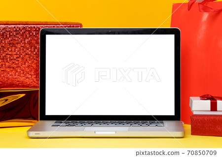 Tula, 28 09 19: Online christmas shopping concept on the laptop display. White screen. Tula, 28 09 19: Online christmas shopping concept on the laptop display. White screen. 70850709